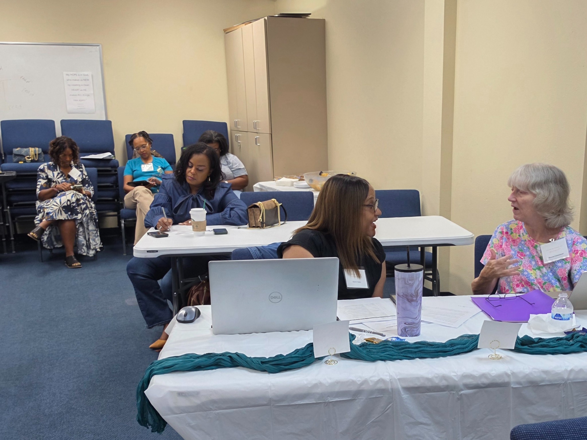 Participants connecting in conversation during the workshop